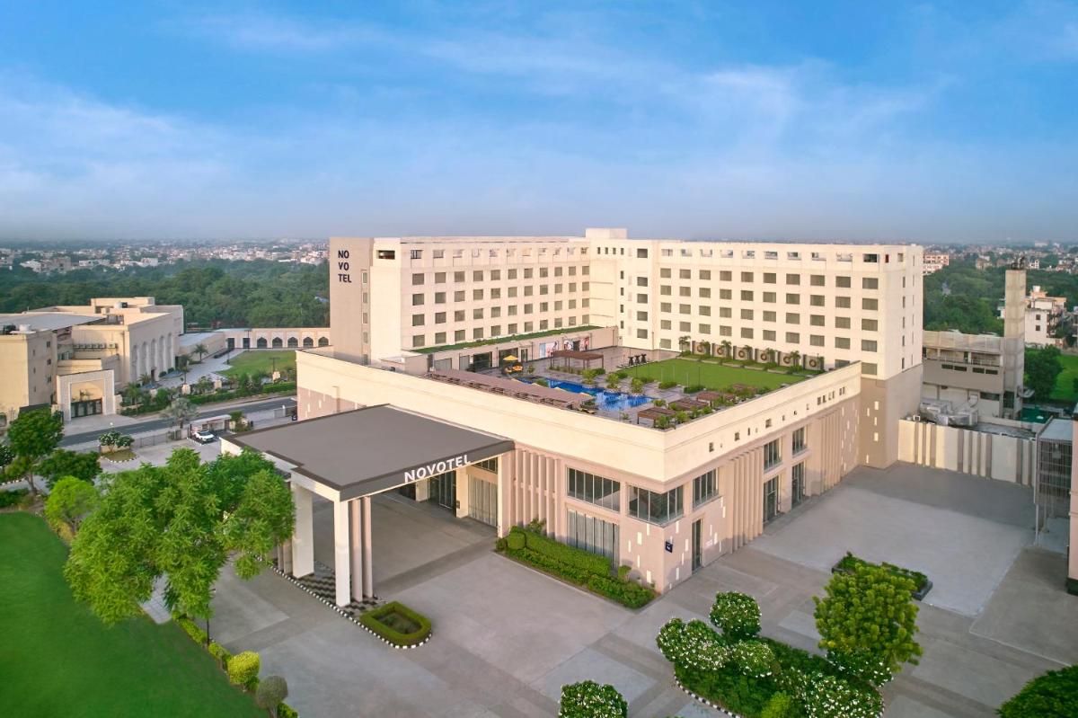an overhead view of a large white building at Novotel Jaipur Convention Centre in Jaipur