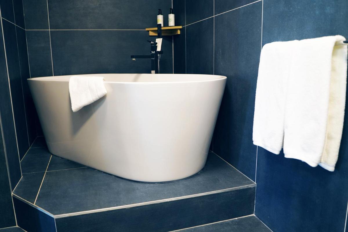 Salle de bains dans l'établissement Hotel Atlantic