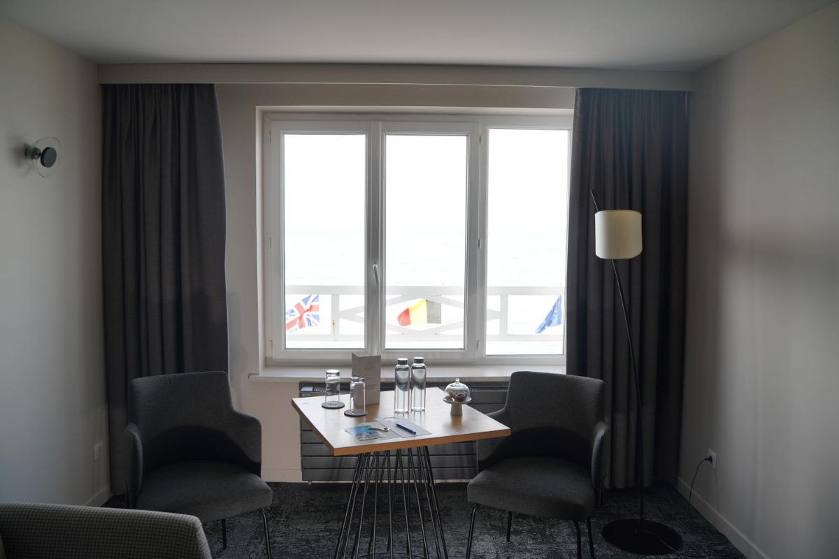 Coin salon dans l'établissement Hotel Atlantic