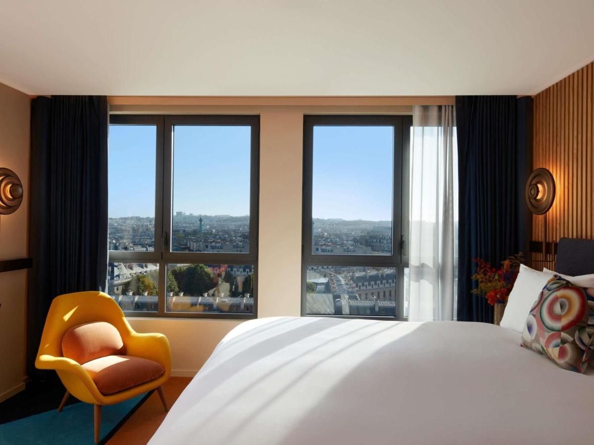 Un ou plusieurs lits dans un hébergement de l'établissement SO/ Paris Hotel