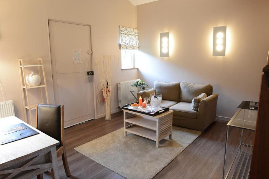Coin salon dans l'établissement Domaine de Joinville & Spa