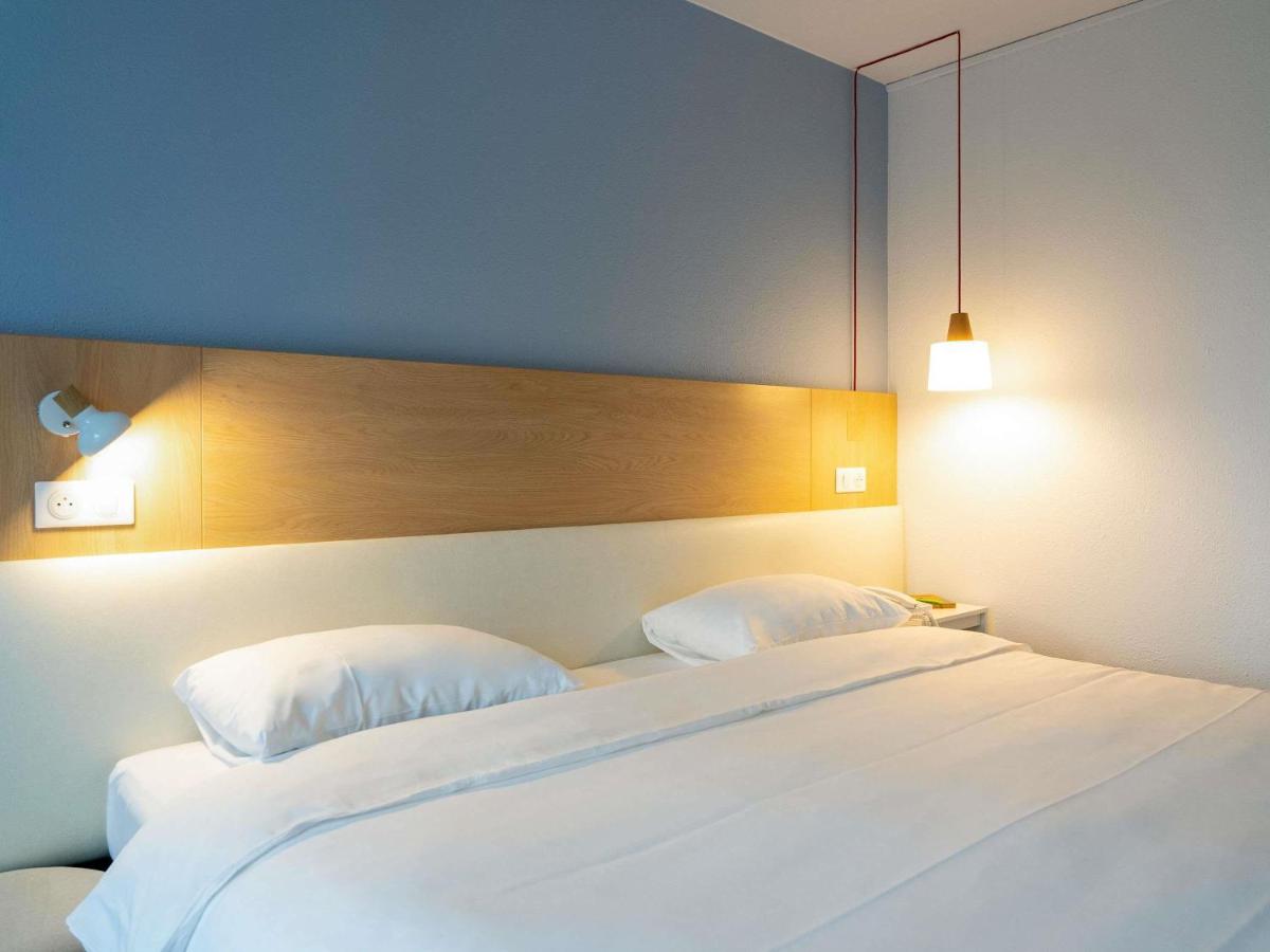 Un ou plusieurs lits dans un hébergement de l'établissement ibis Styles Aix les Bains Domaine de Marlioz