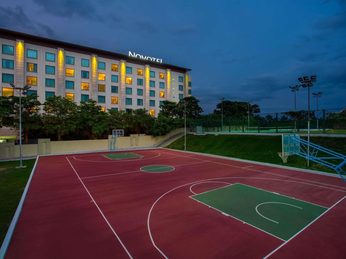 a basketball court in front of a hotel at Novotel Hyderabad Airport in Hyderabad