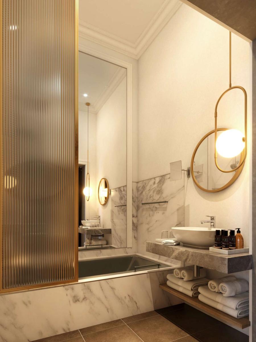 Salle de bains dans l'établissement Cour des Loges Lyon, A Radisson Collection Hotel