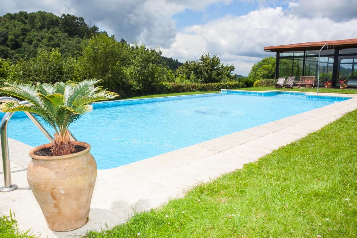 Piscina en o cerca de Hosteria de Torazo Nature Hotel & Spa