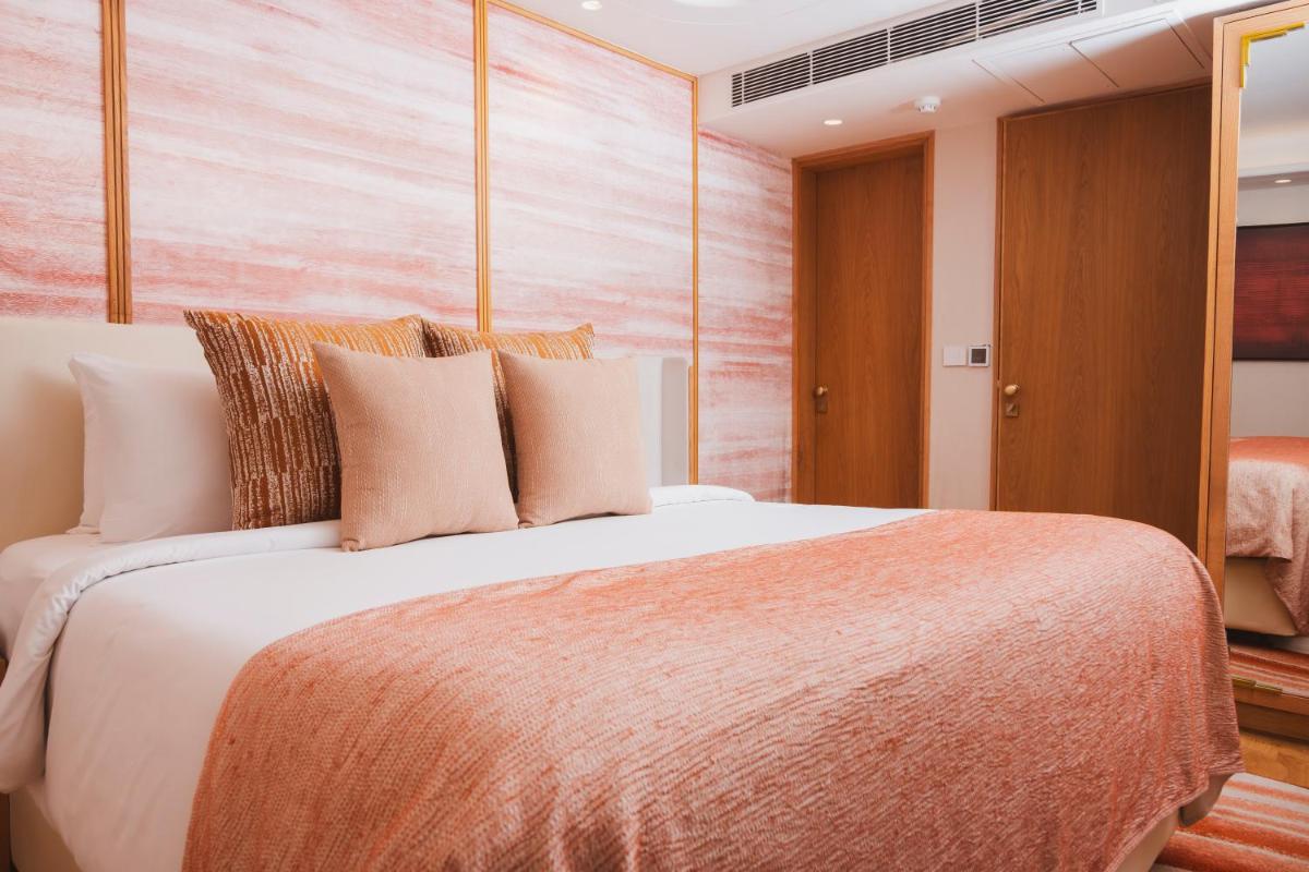 a bedroom with a large bed in a room at The Park New Delhi in New Delhi