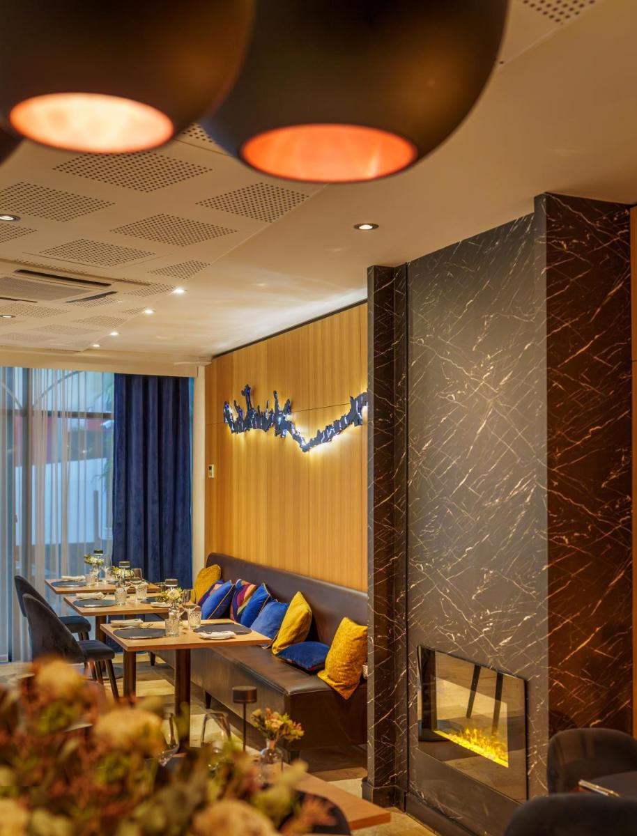Coin salon dans l'établissement Le Richebourg Hôtel, Restaurant & Spa