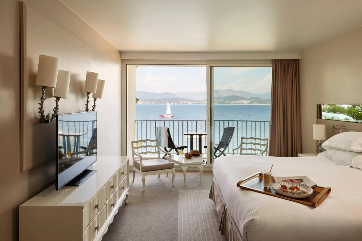 Un ou plusieurs lits dans un hébergement de l'établissement Sofitel Golfe d'Ajaccio Thalassa Sea & Spa