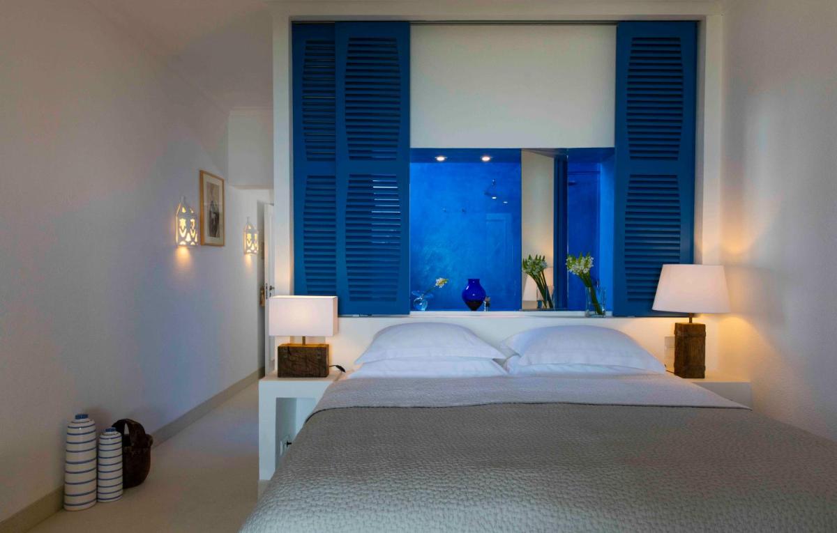 Uma cama ou camas num quarto em Vila Joya