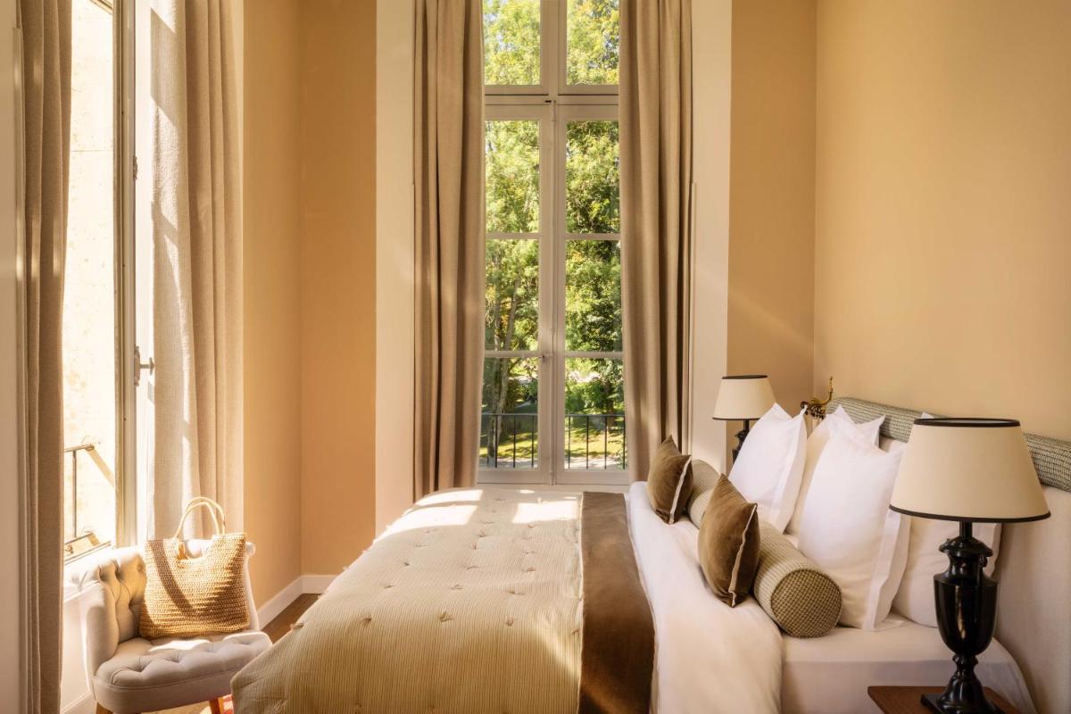 Un ou plusieurs lits dans un hébergement de l'établissement Château d'Augerville Golf & Spa Resort - TemptingPlaces Collection