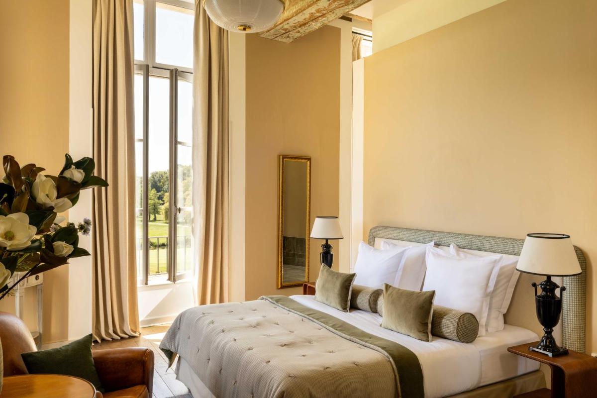 Un ou plusieurs lits dans un hébergement de l'établissement Château d'Augerville Golf & Spa Resort - TemptingPlaces Collection