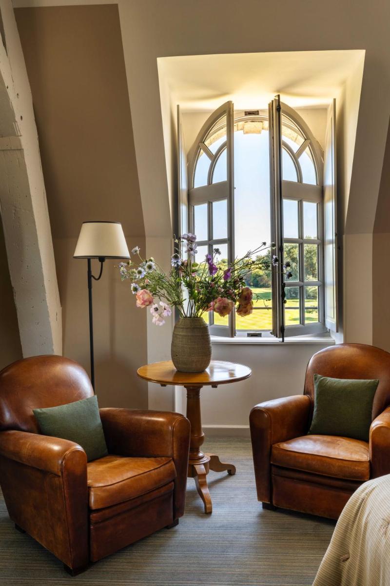 Coin salon dans l'établissement Château d'Augerville Golf & Spa Resort - TemptingPlaces Collection