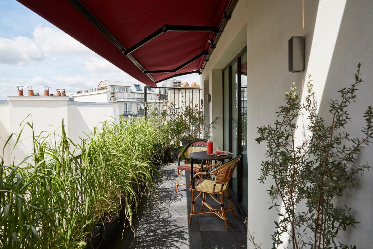 Balcon ou terrasse dans l'établissement Le Roch Hotel & Spa