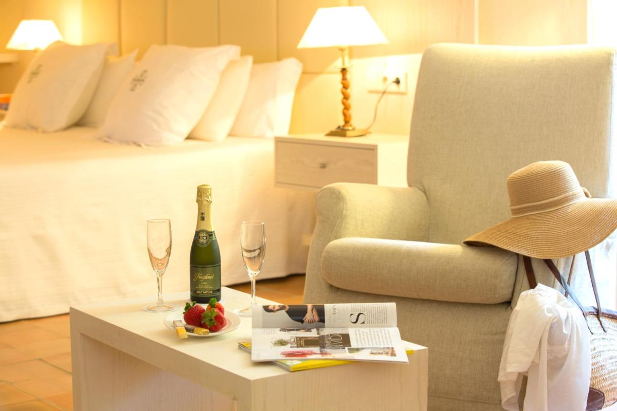 Zona de estar de L’Hermitage Hotel & Spa
