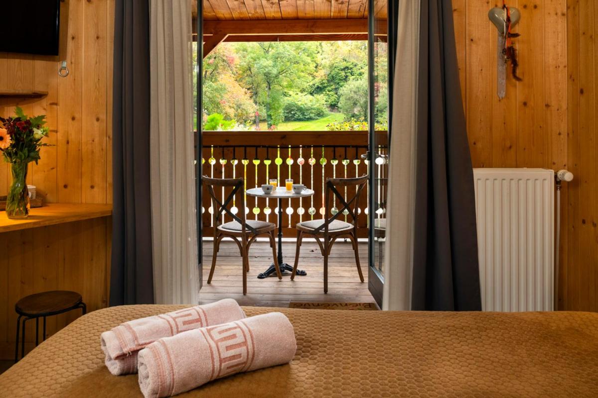 Coin salon dans l'établissement Domaine du Hirtz, Restaurant & Spa