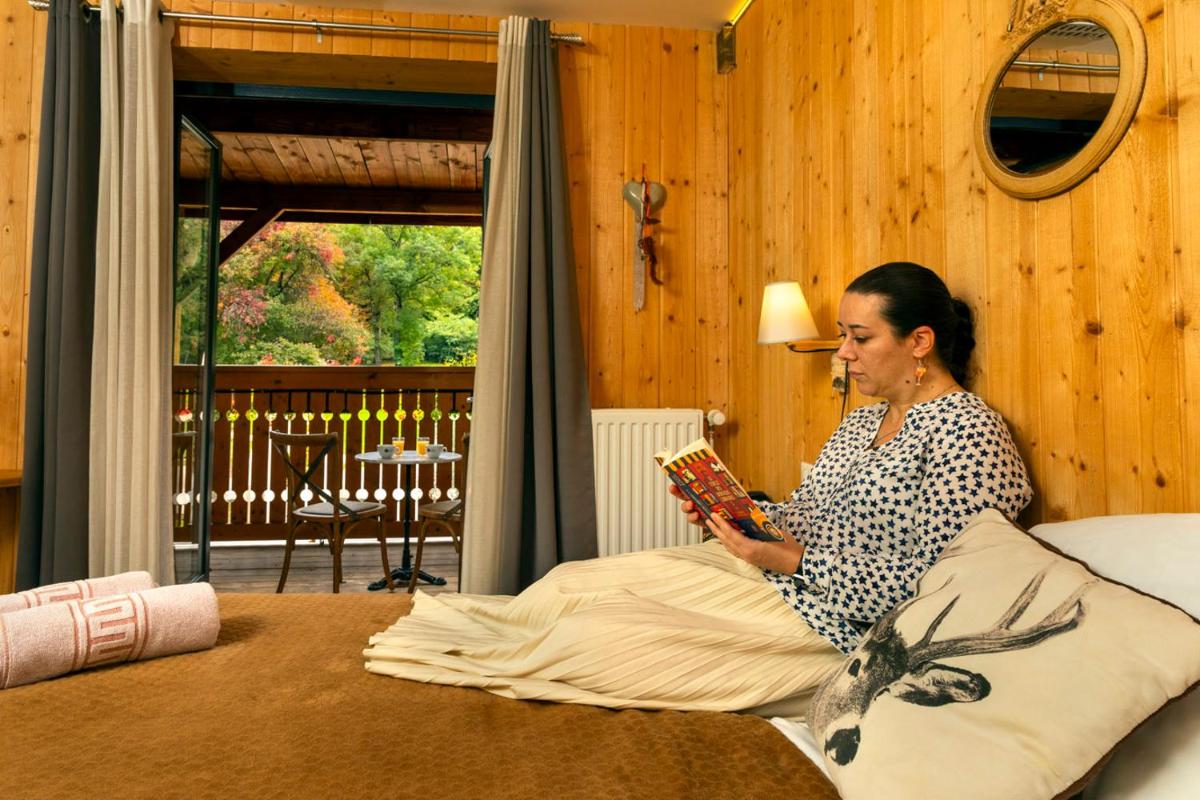 Un ou plusieurs lits dans un hébergement de l'établissement Domaine du Hirtz, Restaurant & Spa
