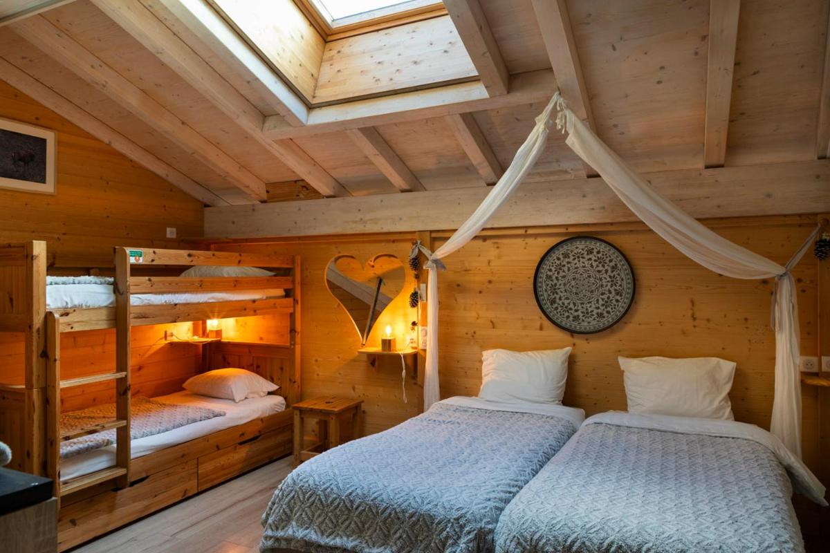 Un ou plusieurs lits dans un hébergement de l'établissement Domaine du Hirtz, Restaurant & Spa