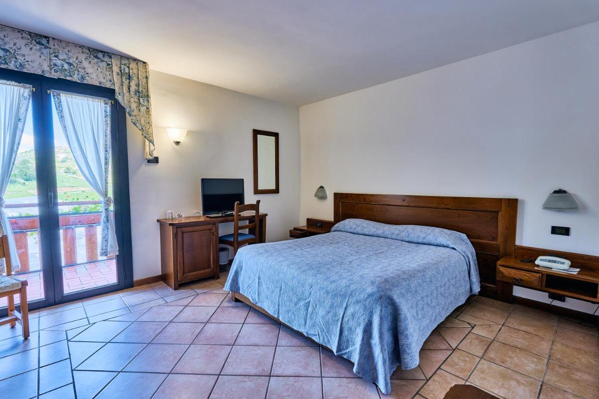 Hotel Pizzalto - Housity