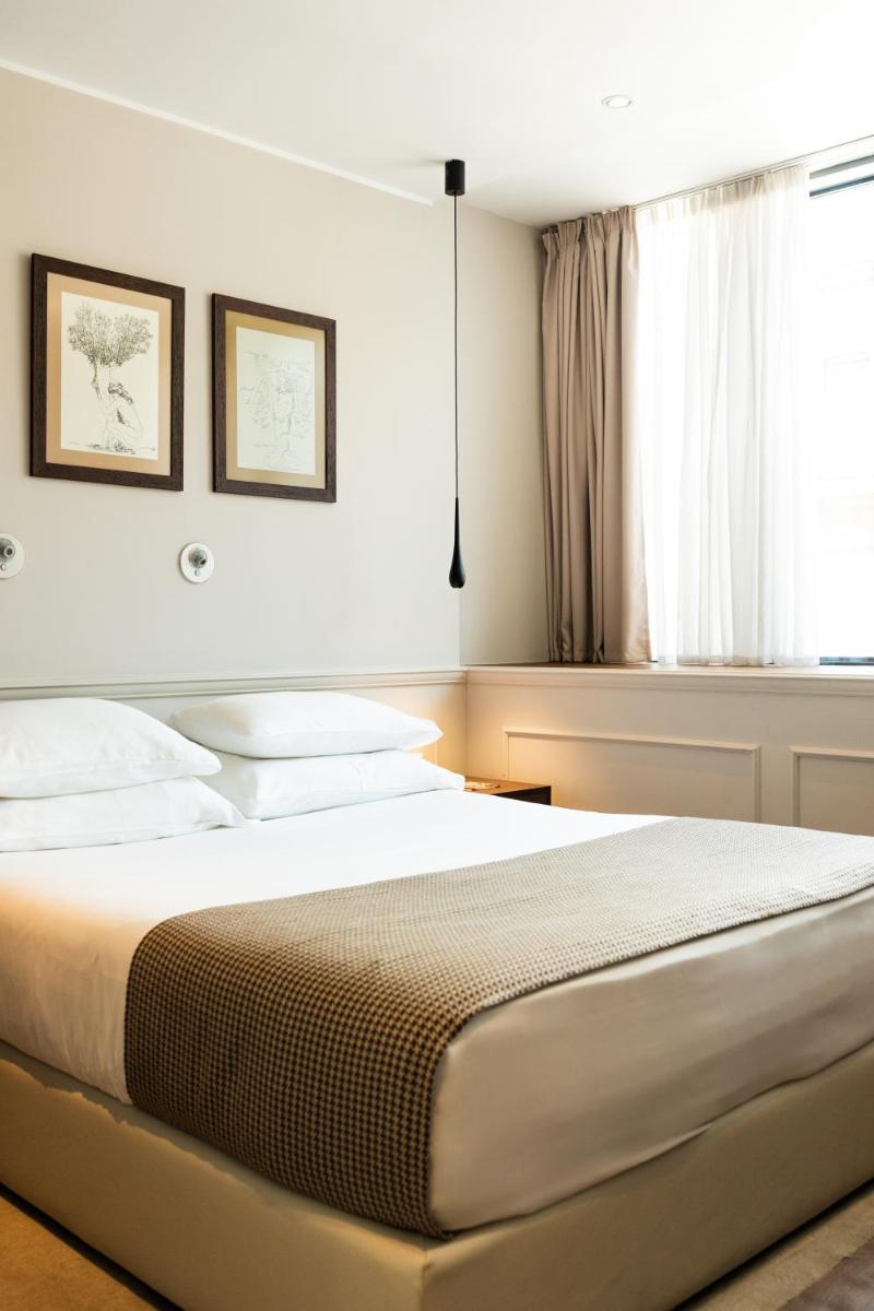 Envoy Hotel - Hizvo