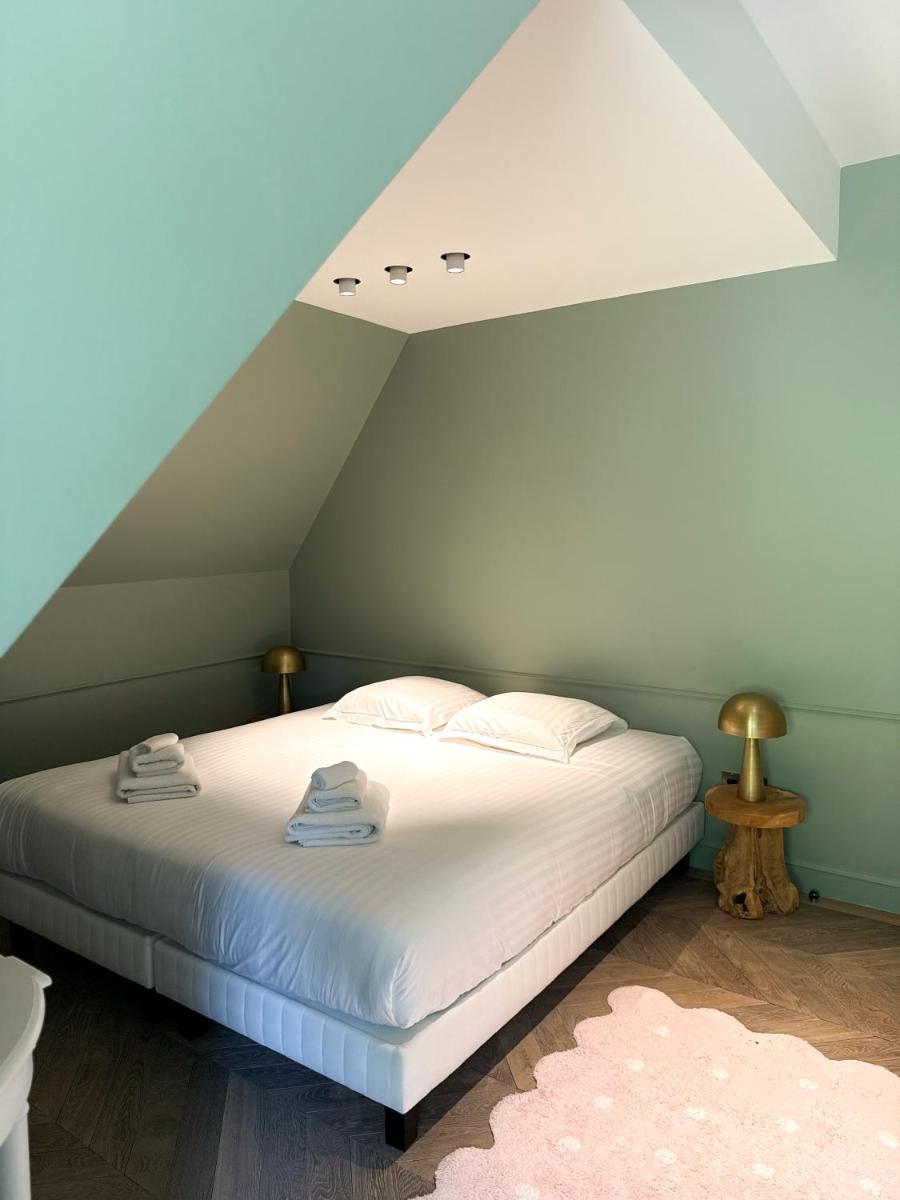 Un ou plusieurs lits dans un hébergement de l'établissement Le Grand Hôtel Le Touquet-Paris-Plage