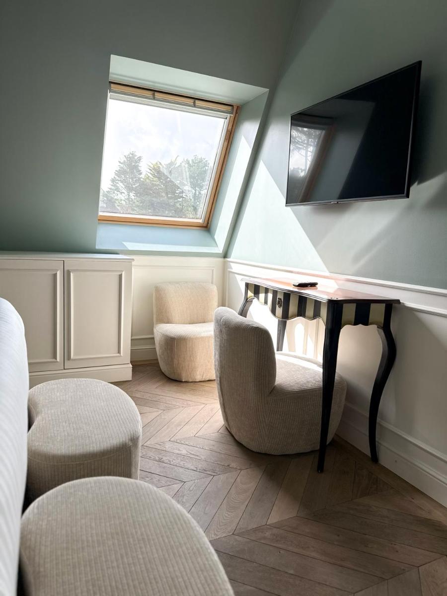 Télévision ou salle de divertissement dans l'établissement Le Grand Hôtel Le Touquet-Paris-Plage