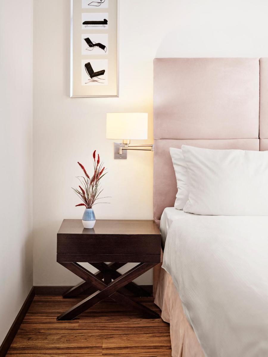 Ein Bett oder Betten in einem Zimmer der Unterkunft ABION Villa Suites