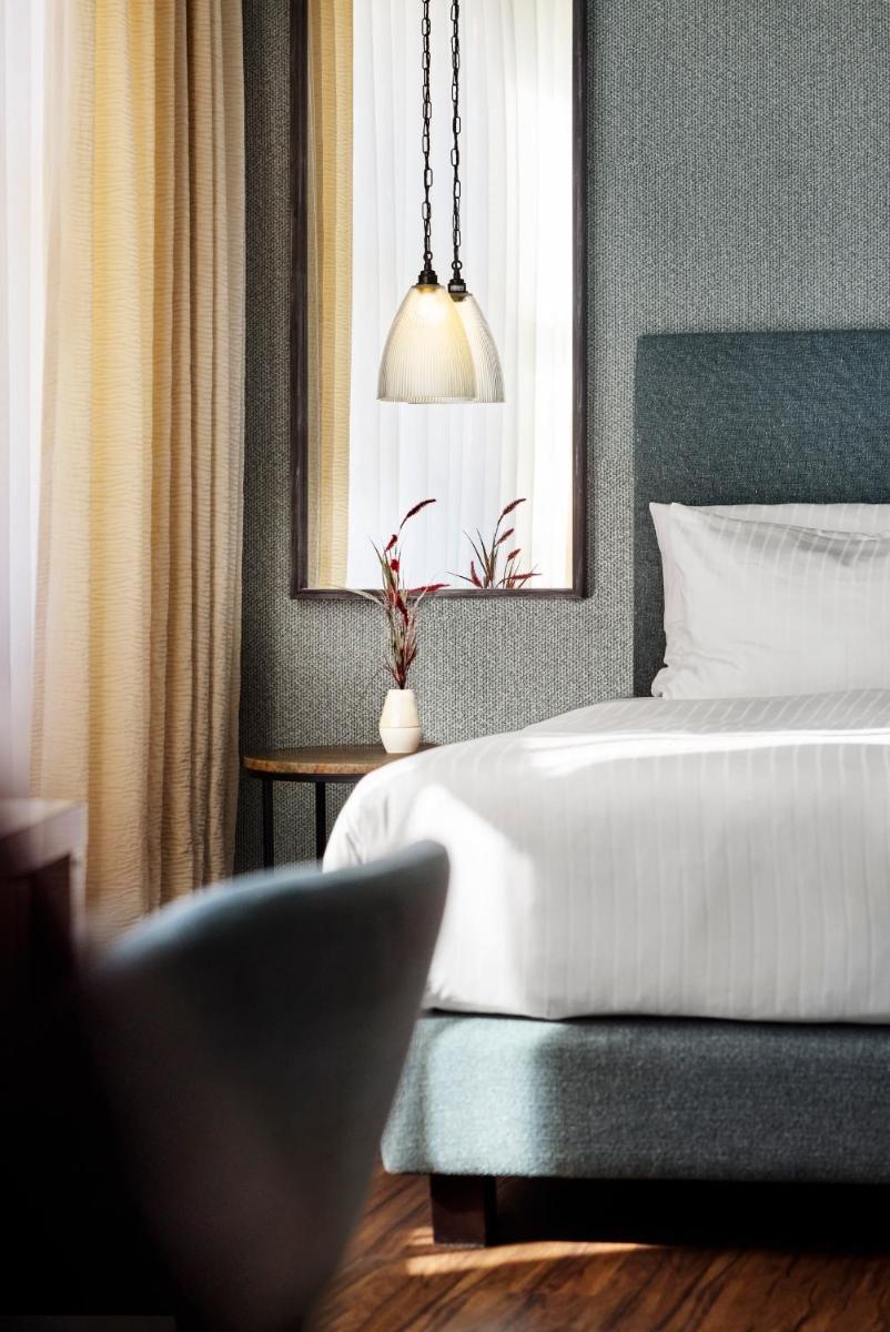 Ein Bett oder Betten in einem Zimmer der Unterkunft ABION Villa Suites