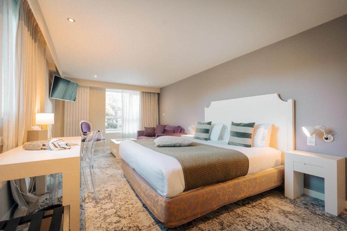 Un ou plusieurs lits dans un hébergement de l'établissement Best Western Plus Le Roi Arthur Hôtel & Spa