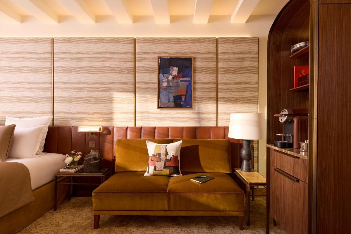 Coin salon dans l'établissement Hôtel D'Aubusson