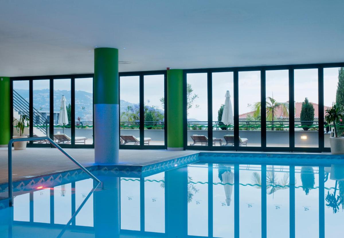 A piscina em ou perto de Madeira Panorâmico Hotel