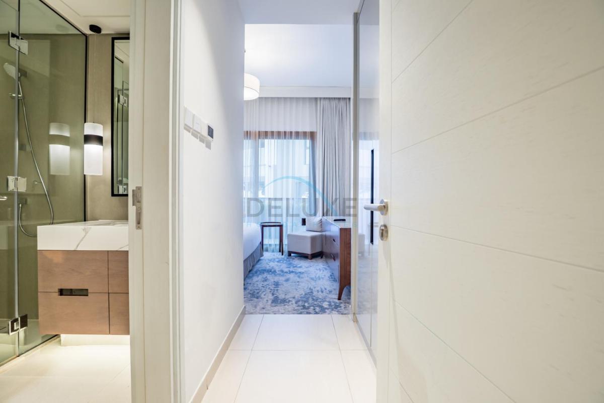 3BR Family Residence with Distant Sea View and Assistant Room, Just Minutes from Fujairah Pristine Beaches, The Address Fujairah Residences Block A, Fujairah by Deluxe Holiday Homes - Housity