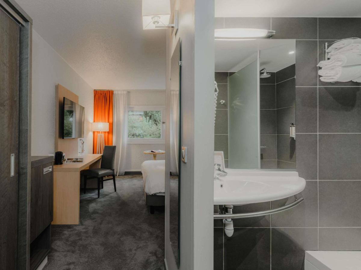 Salle de bains dans l'établissement Mercure Annecy Sud