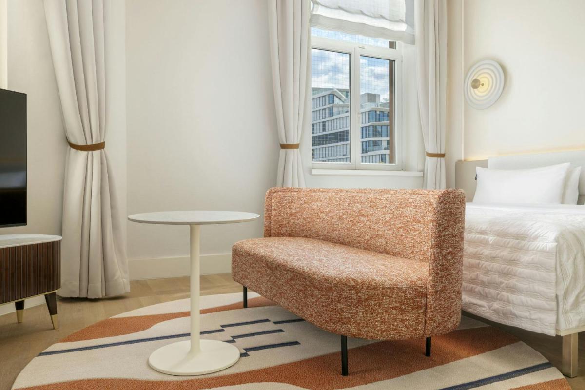 Ein Bett oder Betten in einem Zimmer der Unterkunft Le Méridien Frankfurt