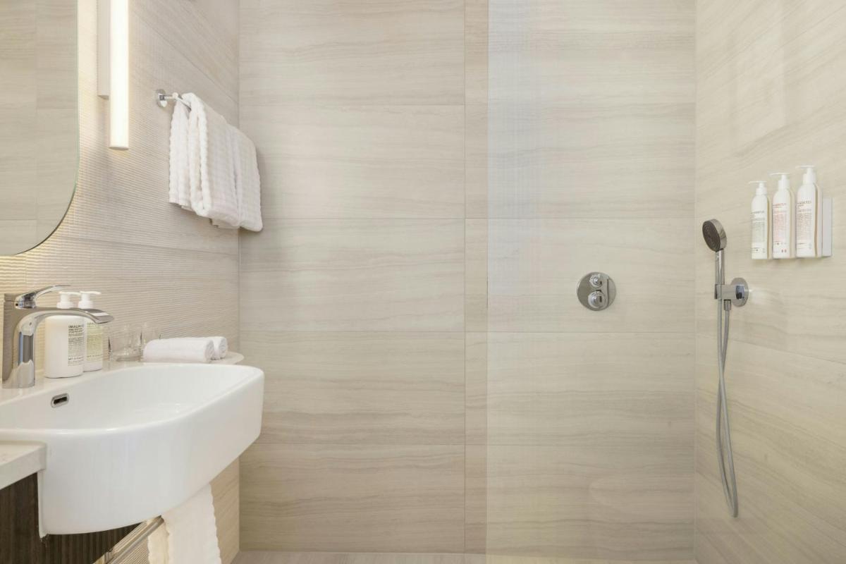 Ein Badezimmer in der Unterkunft Le Méridien Frankfurt