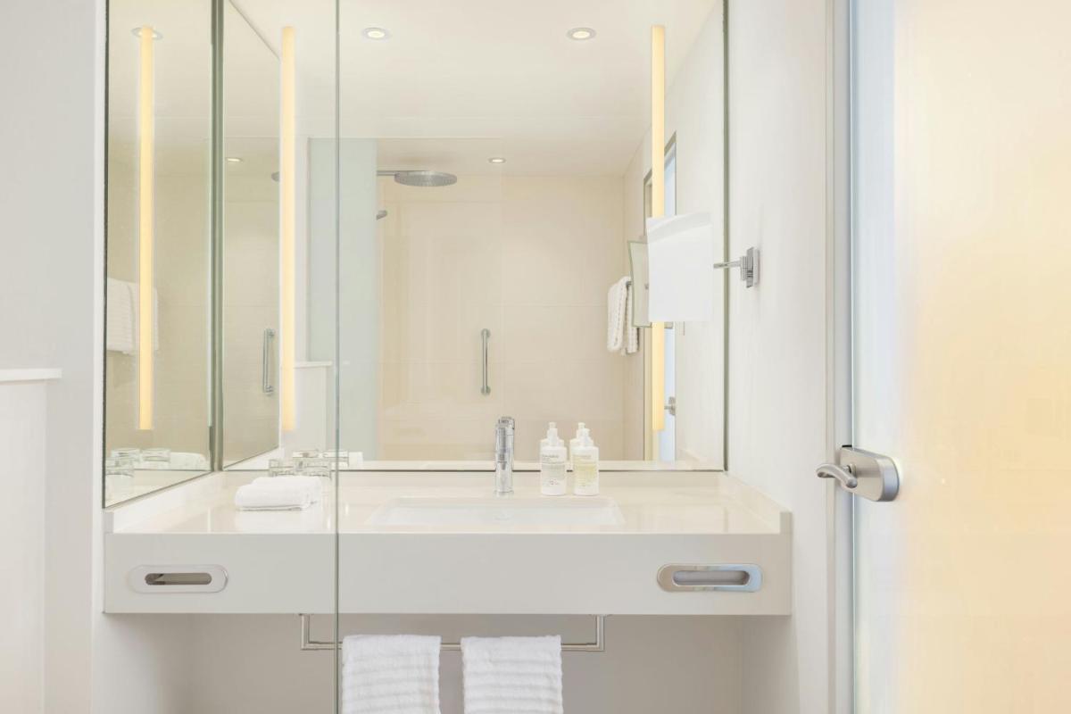 Ein Badezimmer in der Unterkunft Le Méridien Frankfurt