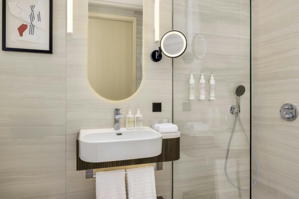 Ein Badezimmer in der Unterkunft Le Méridien Frankfurt