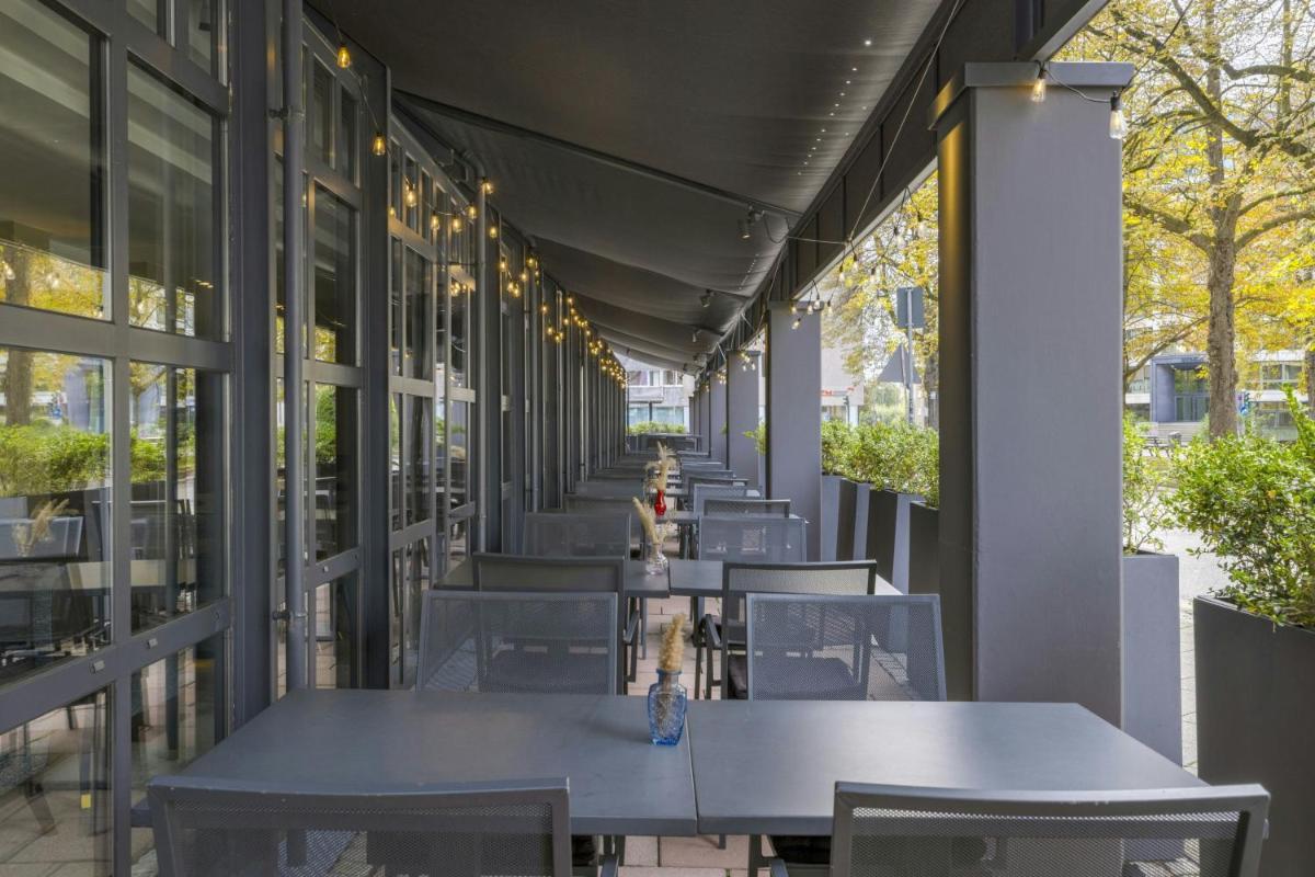 Ein Restaurant oder anderes Speiselokal in der Unterkunft Le Méridien Frankfurt