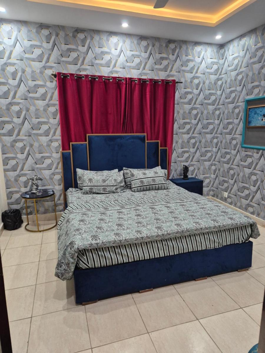 Cozy Two-Bedroom Villa in Safari Homes, Bahria Town Phase 8 with Modern Comforts - Housity