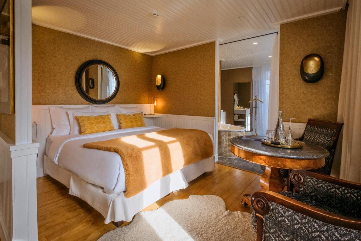 Un ou plusieurs lits dans un hébergement de l'établissement Grand Hotel Soleil d'Or