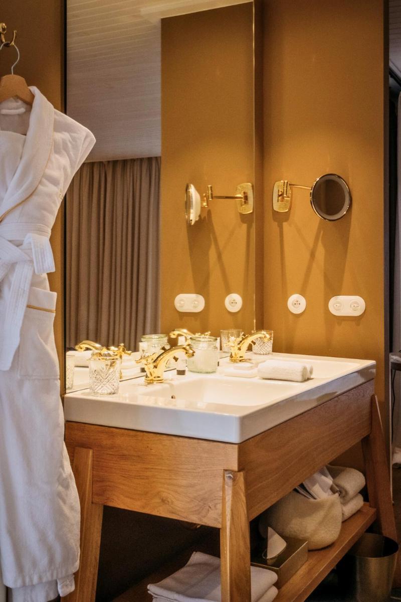Salle de bains dans l'établissement Grand Hotel Soleil d'Or