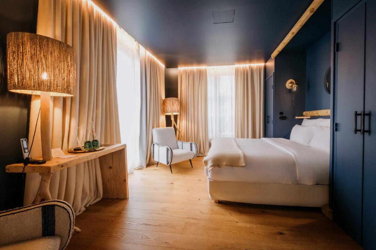 Un ou plusieurs lits dans un hébergement de l'établissement Grand Hotel Soleil d'Or