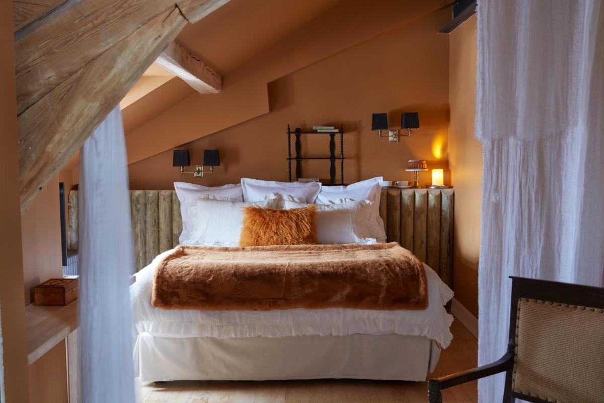 Un ou plusieurs lits dans un hébergement de l'établissement Grand Hotel Soleil d'Or