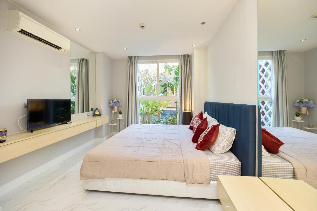 Grande Carribean l Guest Friendly l Seaview Pool view Condo in Pattaya - Hizvo
