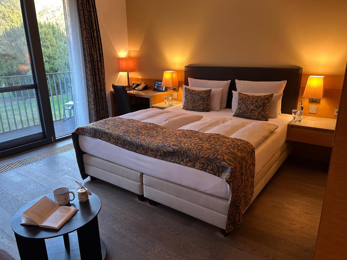 Ein Bett oder Betten in einem Zimmer der Unterkunft Schlossgut Gross Schwansee