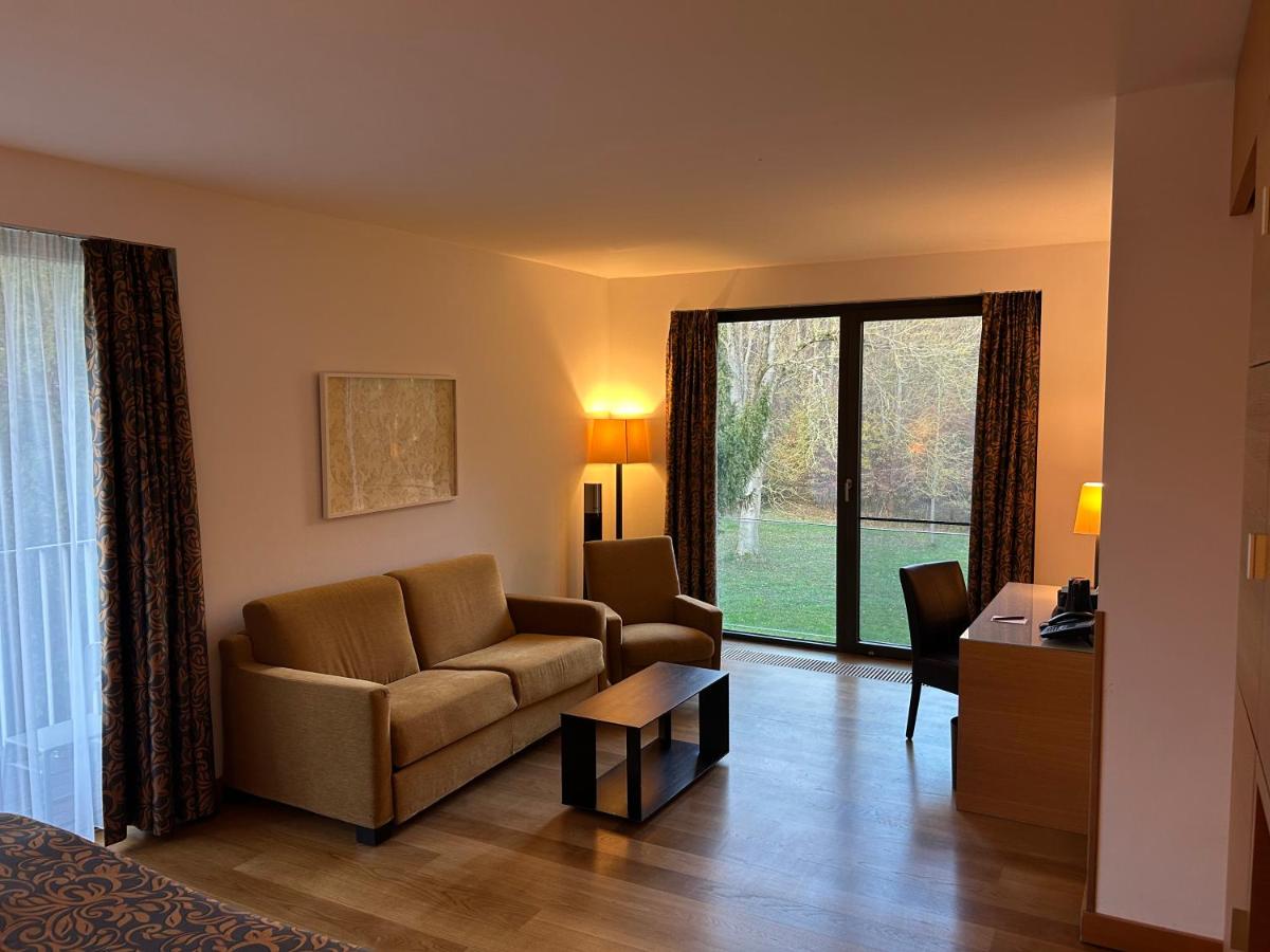 Ein Sitzbereich in der Unterkunft Schlossgut Gross Schwansee