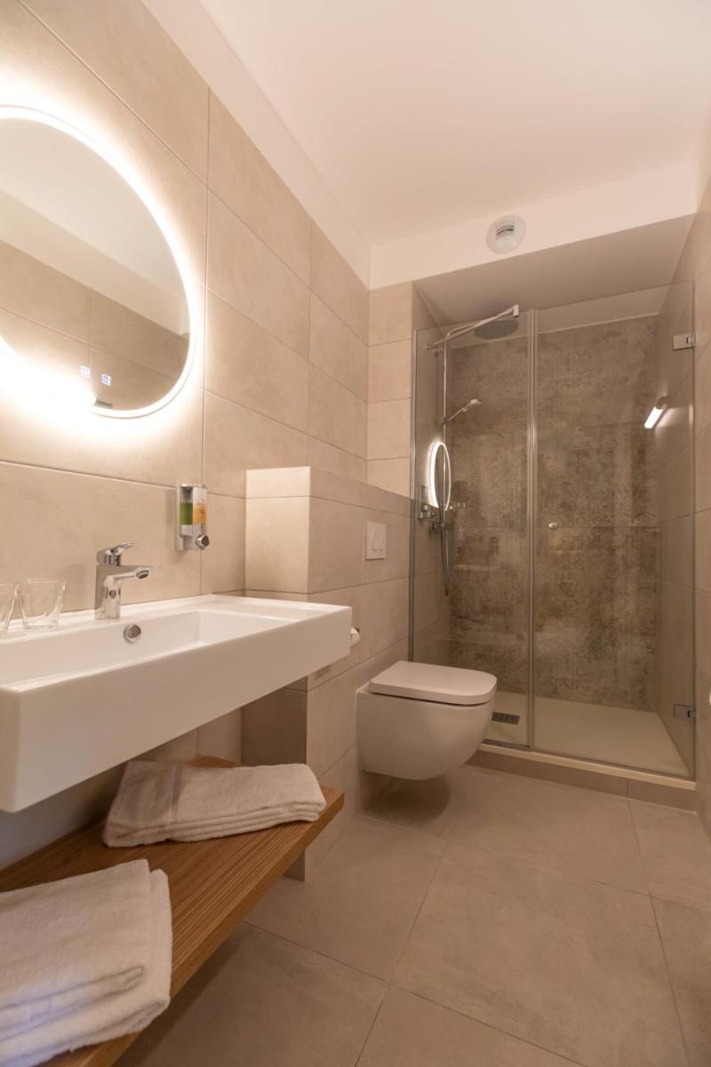 Salle de bains dans l'établissement Hôtel Terra Vinum