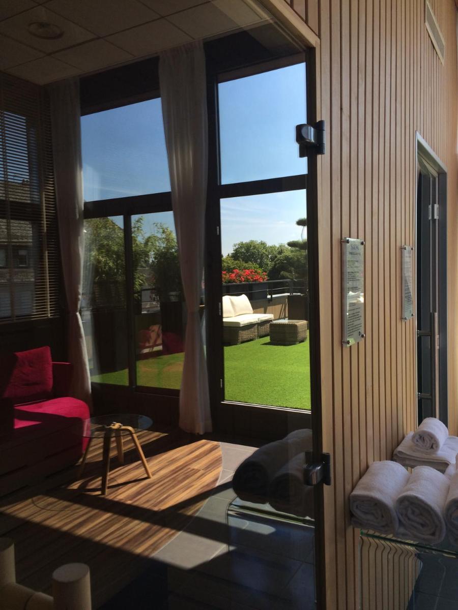 Coin salon dans l'établissement Best Western Plus Thionville Centre