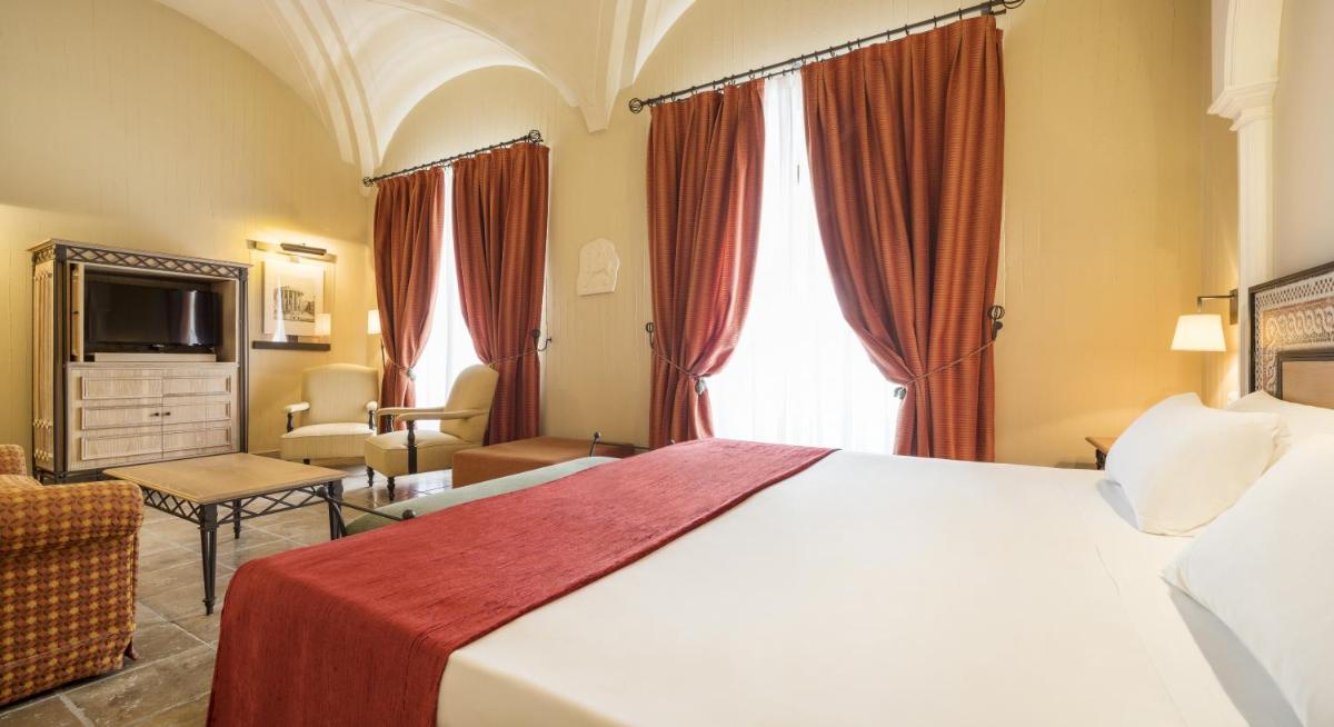 Cama o camas de una habitación en Hotel Ilunion Mérida Palace