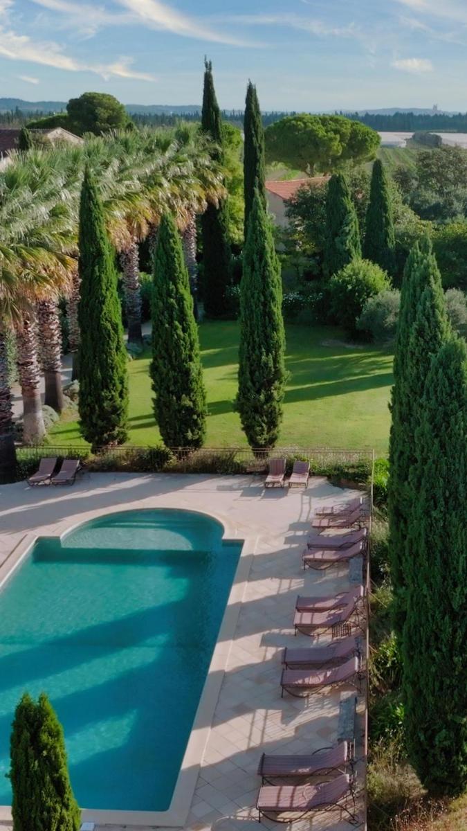 Piscine de l'établissement HOTEL et APPARTEMENTS DOMAINE DES CLOS - Teritoria ou située à proximité
