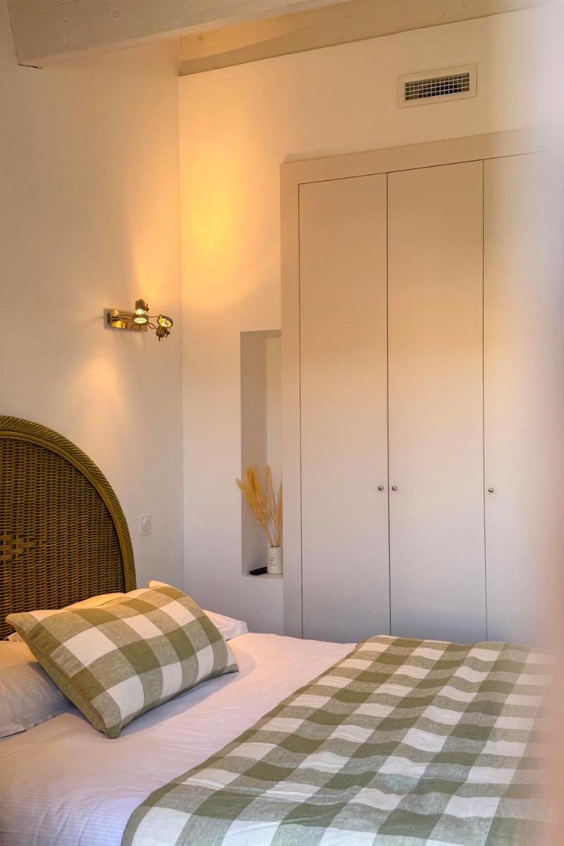 Un ou plusieurs lits dans un hébergement de l'établissement Hôtel & Spa Le Madeloc - Collioure Centre